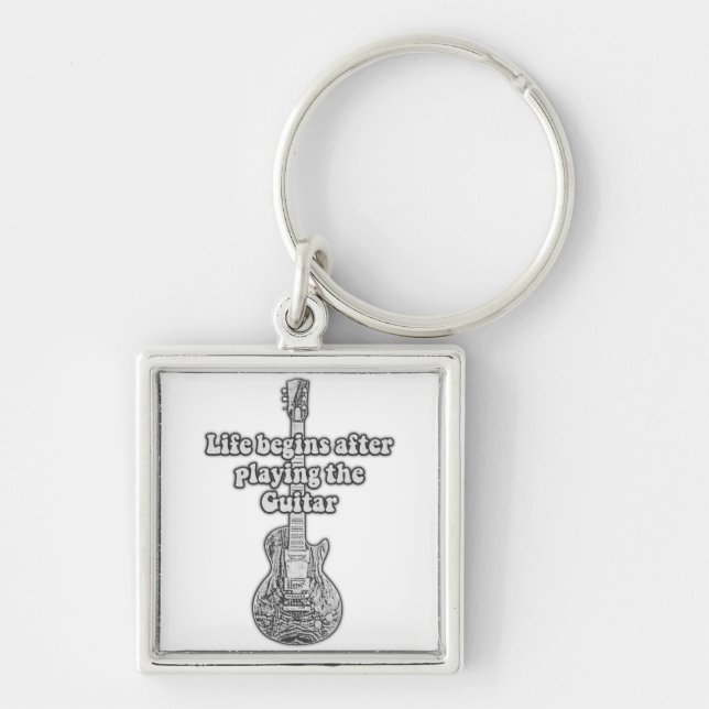 Life begins after playing the guitar. black & whit key ring (Front)