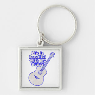 Life is beautiful with my guitar. vintage blue key ring