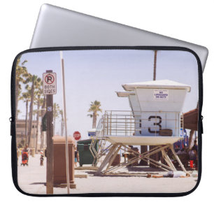 Lifeguard houses under bright skty laptop sleeve