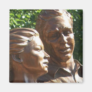 Lifelike outdoor statue of two people dancing magnet