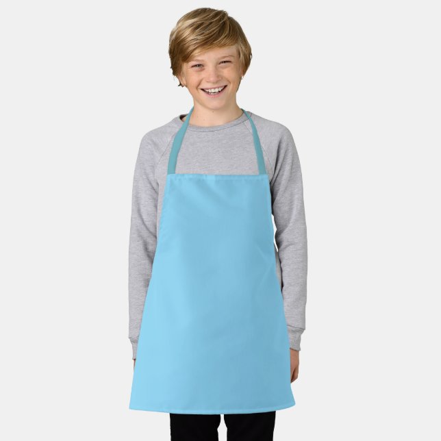 light blue apron with a simple, clean design (Worn)