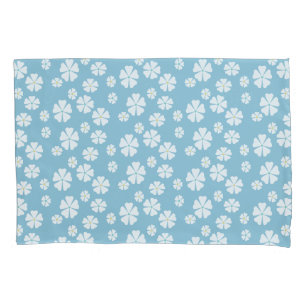 Light blue quilt with white flowers pillowcase