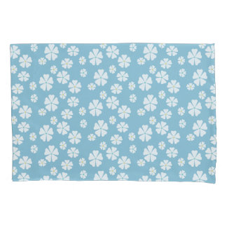 Light blue quilt with white flowers pillowcase