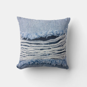 Light blue torn Jeans texture. Cushion