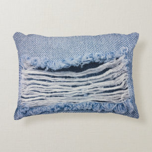 Light blue torn Jeans texture. Decorative Cushion