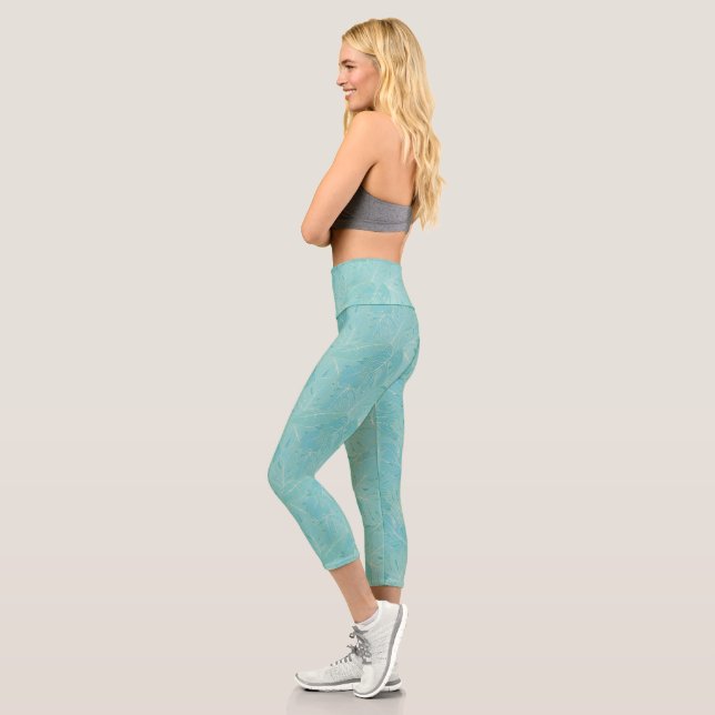 Light blue tropical palm leaves pattern capri leggings (Left)