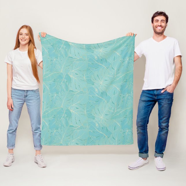 Light blue tropical palm leaves pattern fleece blanket (In Situ)