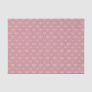 Light bows on soft pink background tissue paper