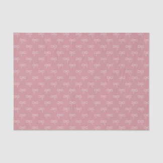 Light bows on soft pink background tissue paper
