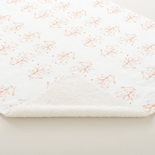 Light brown coral outline on white sherpa blanket