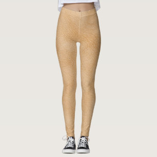 Light brown, leather texture background. leggings