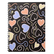 Light coloured hearts on a black background notebo