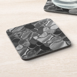 Light gray and dark rounded shapes. coaster