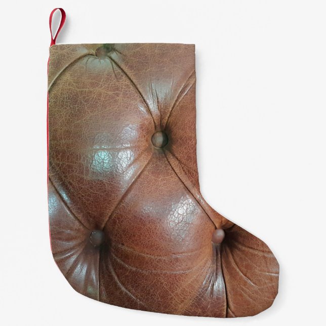 Light on brown leather sofa surface, textureabstra small christmas stocking (Front)
