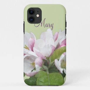 Light pink apple flowers in green background. iPhone 11 case