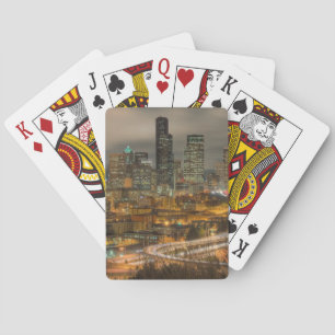 Light streaks from cars at night playing cards