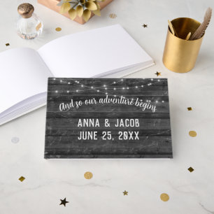 Light String On Gray Dark Wood Wedding Guest Book
