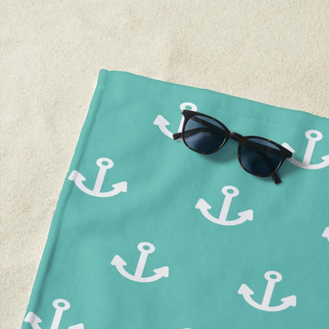 Light teal green anchor white nautical monogram beach towel (In Situ)