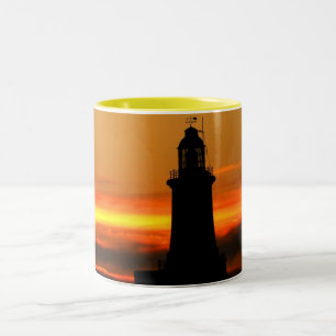 Lighthouse and sky on fire Two-Tone coffee mug