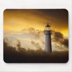Lighthouse Glowing under Dramatic Sky Mouse Mat
