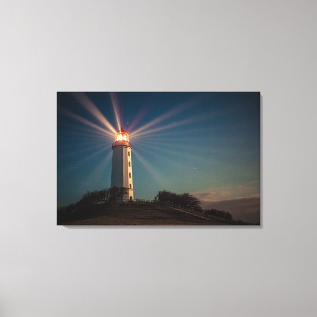 Lighthouse on a Hill Shining at Night Canvas Print (Front)
