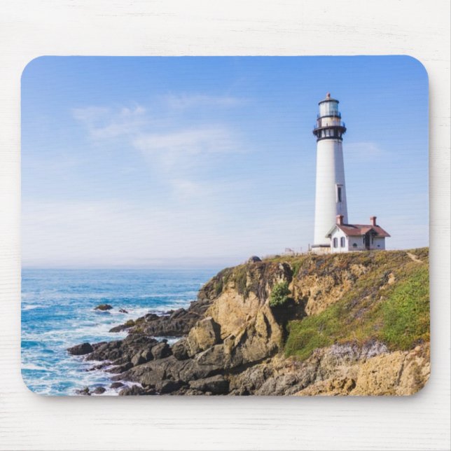 Lighthouse on hill blue sky white house ocean mouse mat (Front)
