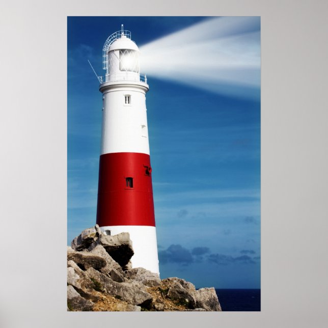 Lighthouse on rocks with light beams poster (Front)