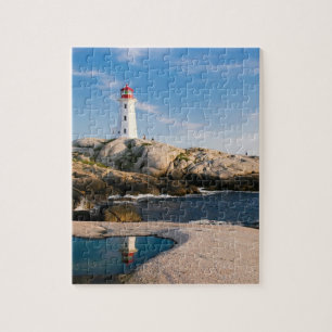 Lighthouse on Rocks with Ocean Reflection Jigsaw Puzzle
