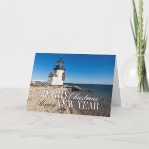 Lighthouse on the Beach with a Christmas Wreath Holiday Card