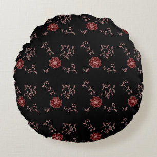 Lila blush and wine flower with leaves on black round cushion