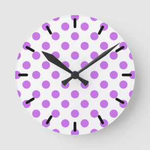 Lilac and white polka dots round clock