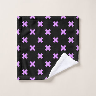 Lilac cross stitches on black wash cloth