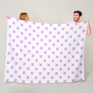 Lilac cross stitches on white fleece blanket