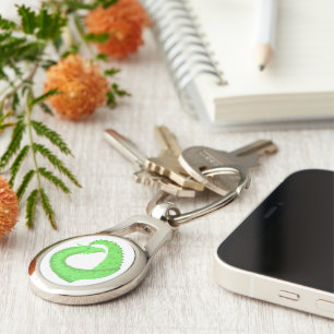 Lime green heart dragon on white key ring