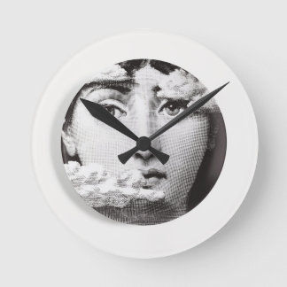 lina cavalieri round clock