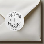 Line Art Botanical Wreath Wedding Monogram Classic Round Sticker<br><div class="desc">Custom-designed wedding monogram stickers featuring elegant hand drawn style botanical wreath with couple's initials and wedding date. Perfect for wedding save the dates,  envelops,  wedding favour packagings and more.</div>