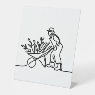 line drawing of a farmer or gardener pedestal sign
