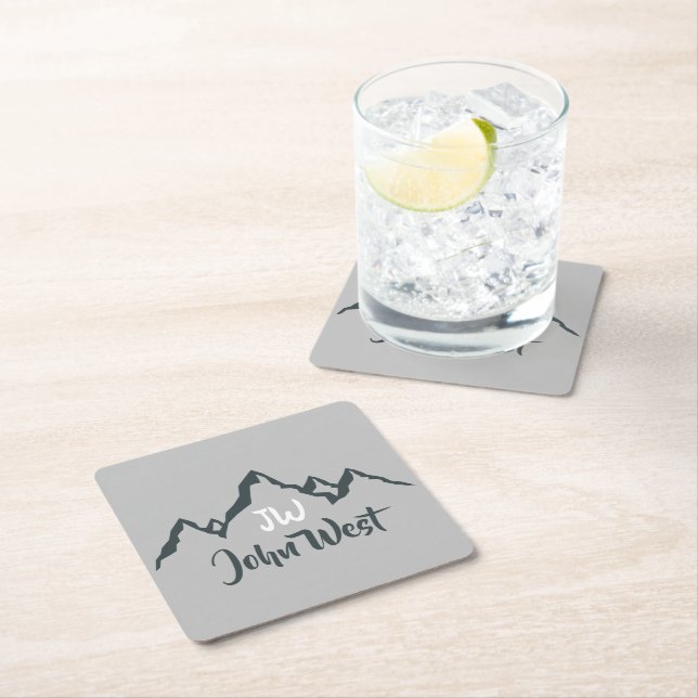 Line drawn mountain range personalizable monogram square paper coaster (Insitu)