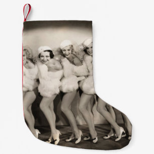 Line of chorus girls in white furvintage, retro, 1 small christmas stocking