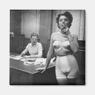 Lingerie model smoking in an office magnet