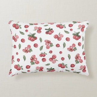 Lingonberries on a white background in a northern  decorative cushion