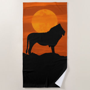 Lion at sunset beach towel