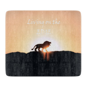 Lion at sunset Living on the EDGE Cutting Board