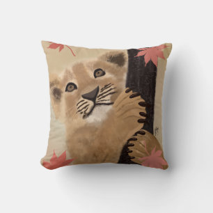 lion cushion playing