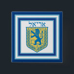 Lion of Judah Emblem Ariel Hebrew 15 Cm Square Badge<br><div class="desc">Square button with an image of a blue and yellow Lion of Judah emblem on white with light blue and dark blue borders and “Ariel” in Hebrew in blue letters above it. See matching square charm, large square premium metal keychain, square double-sided acrylic keychain, round necklace and wrist watch. See...</div>