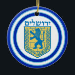 Lion of Judah Emblem Jerusalem Hebrew Ceramic Tree Decoration<br><div class="desc">Round ceramic ornament with an image,  on both sides,  of a blue and yellow Lion of Judah emblem and wide double blue borders trimmed in light blue on white. See the entire Hanukkah Ornament collection under the HOME category in the HOLIDAYS section.</div>