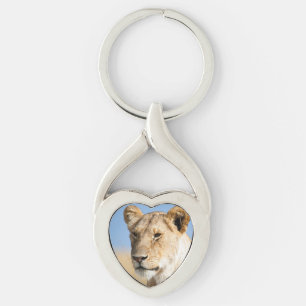 Lioness against blue sky key ring