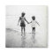 Little boy and girl holding hands magnet