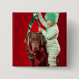 Little boy decorating a dog 15 cm square badge