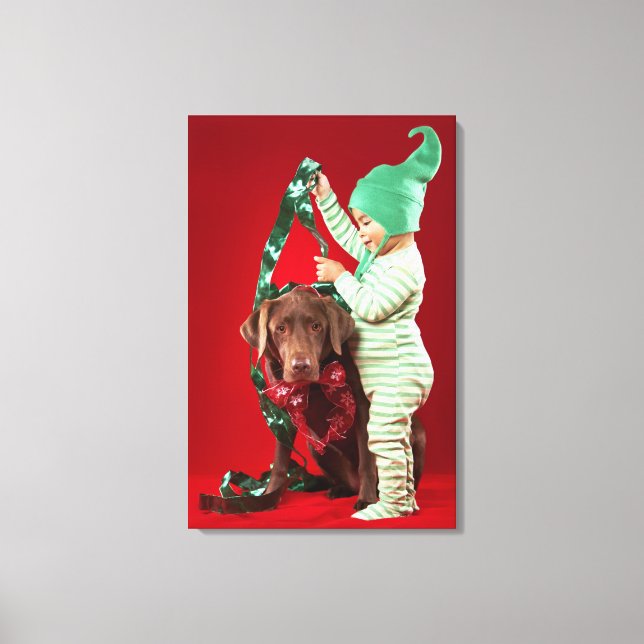 Little boy decorating a dog canvas print (Front)